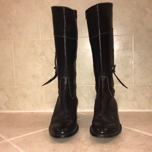 Black lug-soled riding boot with buckles